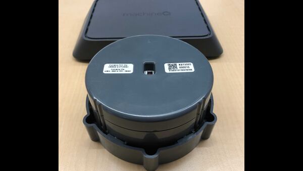 A sensor attached inside a trash can lid signals when it has collected enough refuse that it needs to be emptied.