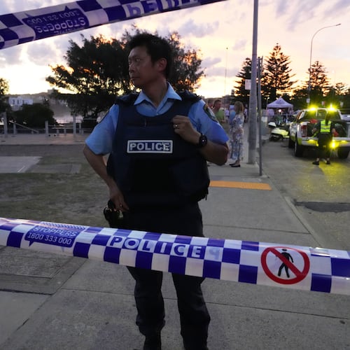 FILE - Police cordon off an area at Bondi Beach after a reported shooting in Sydney, Dec. 14, 2025. (AP Photo/Mark Baker, File)