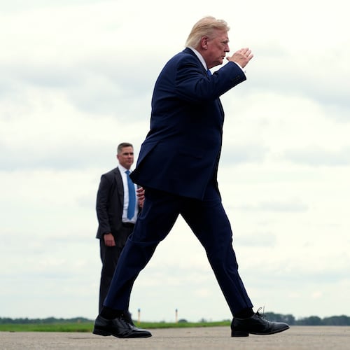 President Donald Trump walks to board Air Force One at Morristown Municipal Airport, in Morristown, N.J., Sunday, Aug. 2, 2026, en route to return to Washington. (AP Photo/Jacquelyn Martin)