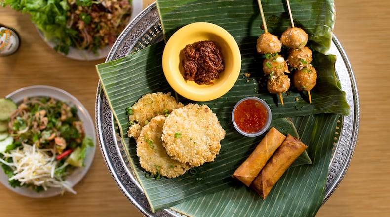 Snackboxe Bistro appetizer plate with Egg Rolls, Khao Chee, and Meatballs. Photo credit- Mia Yakel.