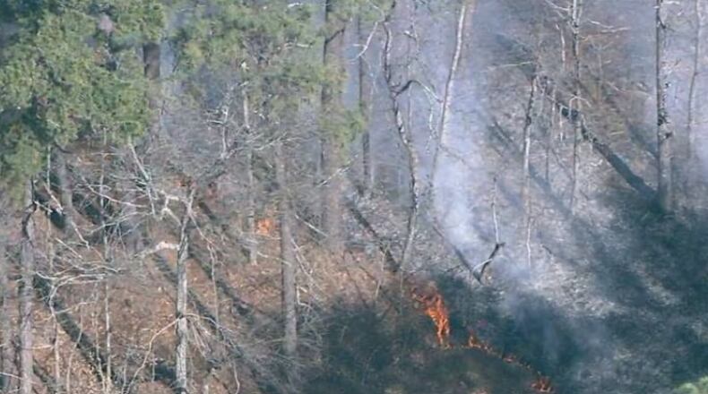 A large brush fire was reported Monday outside Stone Mountain Park, officials said.