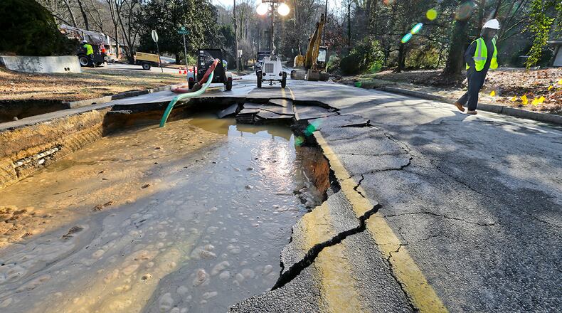 Jan. 27, 2014 Atlanta: The weather is to blame for ruptured water main and a sinkhole that swallowed a section of a northwest Atlanta street early Monday, Jan. 27, 2014 a city official said. The sinkhole engulfed one lane of Collier Drive, which was shut down between Valley Heart Drive and Chalmers Drive, according to Scheree Rawles, spokeswoman for the city's Department of Watershed Management. Rawles blamed the rupture on the recent cold weather. "It was really freezing cold two days go, then yesterday, it was 56 degrees," she told The Atlanta Journal-Constitution. "The pipe expands, contracts, expands, contracts, and it can cause the pipe to burst." The problem started out as a small hole in the pavement, but "as the water continued to flow, it caused a sinkhole," Rawles said. "The sinkhole is probably five feet deep, maybe 12 feet wide." She said other utilities in the area complicated the repair process. "There is a piece of the road that has washed away and there are fiber optics in that piece of the road," she said. "Also, there was a power pole leaning and we called Georgia Power and we had to wait on them to come out." Rawles said crews hoped to have the pipe repaired and the road resurfaced by late Monday afternoon. JOHN SPINK/JSPINK@AJC.COM