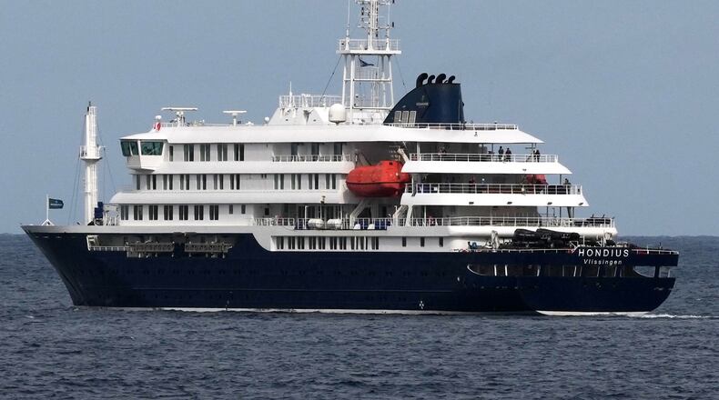The MV Hondius cruise ship departs the port in Praia, Cape Verde, Wednesday, May 6, 2026. (AP Photo/Misper Apawu)