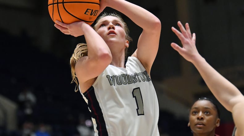 March 13, 2021 Macon - Woodstock's Bridget Utberg (1) gets off a shot during the 2021 GHSA State Basketball Class AAAAAAA Girls Championship game at the Macon Centreplex in Macon on Saturday, March 13, 2021 Marietta won 52-47 over Woodstock. (Hyosub Shin / Hyosub.Shin@ajc.com)