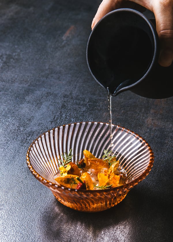 The 12-course tasting menu will feature local, peak season ingredients. A preview of the menu included a course of Georgia royal red shrimp with sungold tomatoes, fermented strawberry and bay laurel. (Courtesy of Dave Crawford)