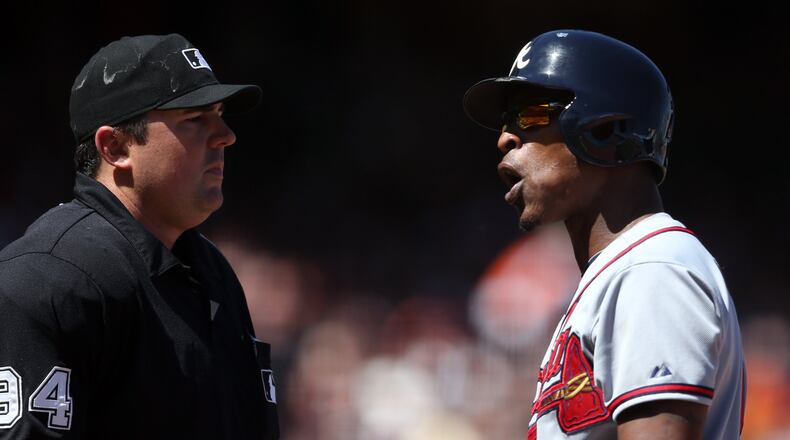 The Atlanta Braves' B.J. Upton, right, argues with home plate umpire Lance Barrett after striking out against the San Francisco Giants in the sixth inning at AT&T Park in San Francisco on Wednesday, May 14, 2014. Upton was ejected as the Giants beat the Braves, 10-4. (Ray Chavez/Bay Area News Group/MCT) B.J. Upton argued with umpire after one of his strikeouts in San Francisco. (Bay Area News Group photo)