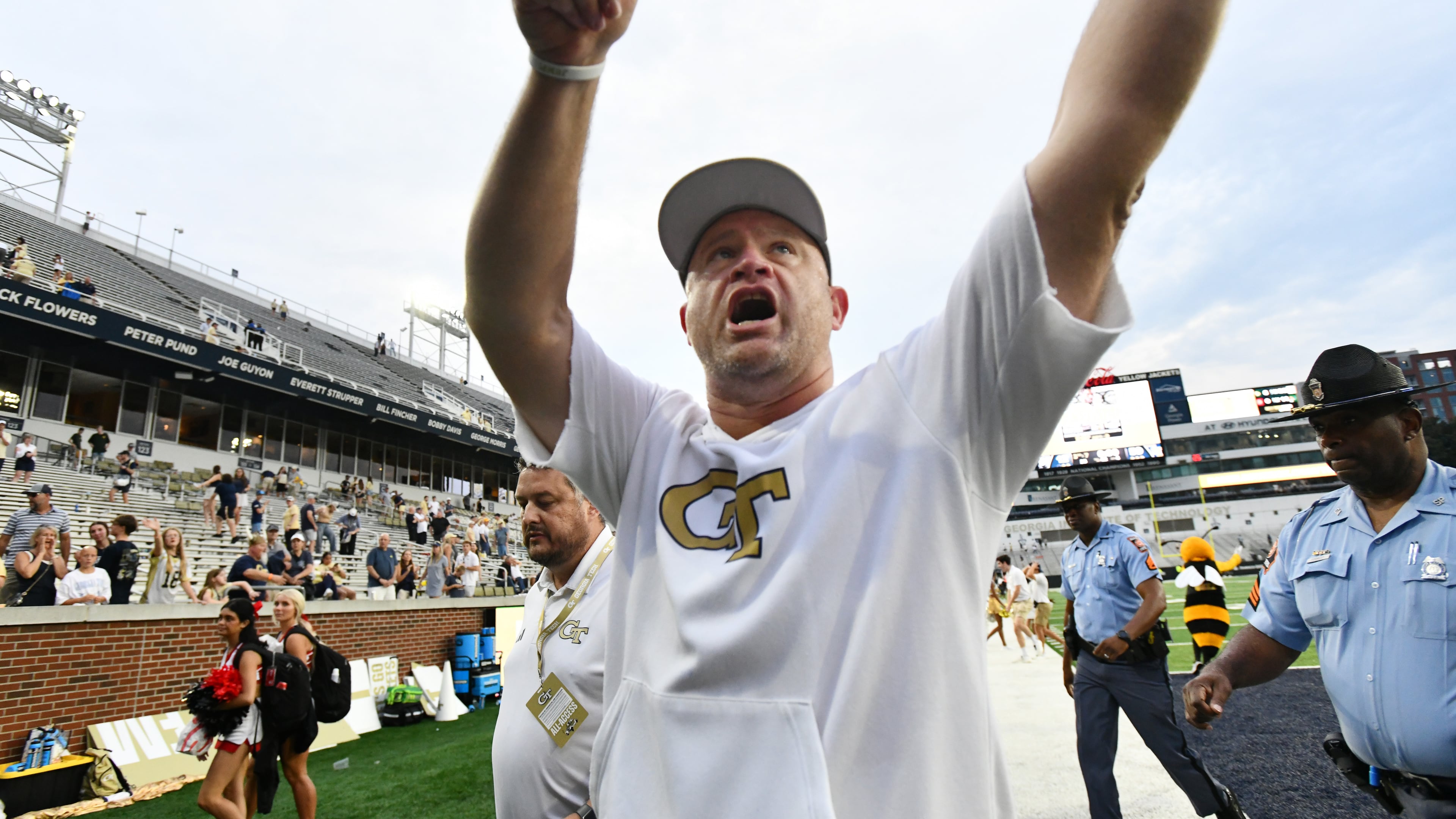 Georgia Tech head coach Brent Key waves to fans as he leaves the football field after Georgia Tech beat Gardner-Webb during an NCAA college football game at Georgia Tech's Bobby Dodd Stadium, Saturday, Sept. 6, 2025, in Atlanta. (Hyosub Shin/AJC)