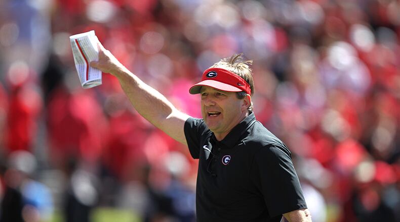 Georgia coach Kirby Smart is scheduled to co-host a camp with Michigan coach Jim Harbaugh. TAYLOR CARPENTER / TAYLOR.CARPENTER@AJC.COM