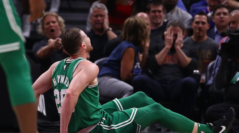 Gordon Hayward sits on the floor after being injured while playing the Cleveland Cavaliers at Quicken Loans Arena Oct. 17, 2017 in Cleveland.