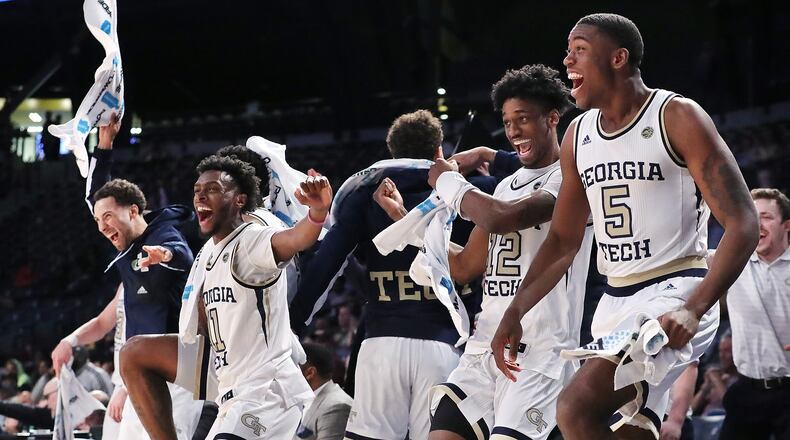 Georgia Tech players (from left) Jose Alvarado, Bubba Parham, Khalid Moore and Moses Wright react as teammate Niko Broadway makes a reverse layup for a basket in the final minutes of a 82-54 victory over Morehouse in a NCAA college basketball game on Tuesday, January 28, 2020, in Atlanta.   Curtis Compton ccompton@ajc.com