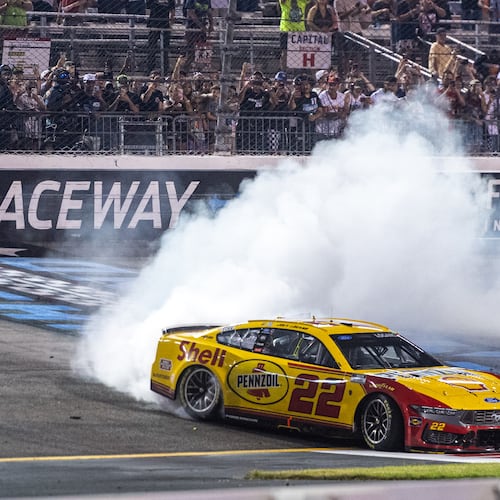 Team Penske driver Joey Logano (22) wins the Cook Out 400 at Richmond Raceway, Saturday, Aug. 15, 2026, in Richmond Va. (AP Photo/Robert Simmons)