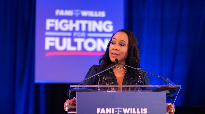 Fulton County District Attorney Fani Willis addresses the crowd Tuesday at her official campaign event in Buckhead after winning the Democratic primary. She will face Republican Courtney Kramer in November. (Ben Hendren for The Atlanta Journal Constitution)
