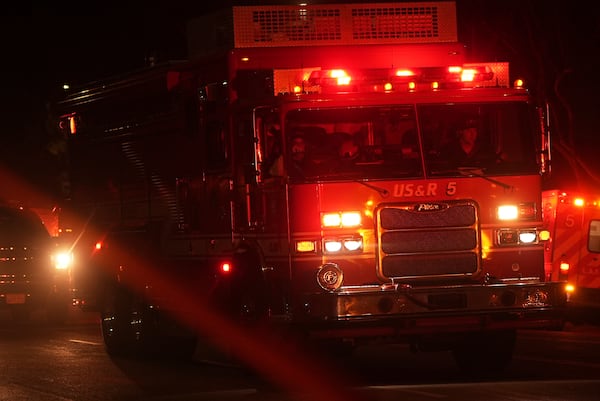 A Los Angeles Fire Department truck leaves after a tunnel collapsed on Wednesday, July 9, 2025, in Los Angeles. (AP Photo/Damian Dovarganes)