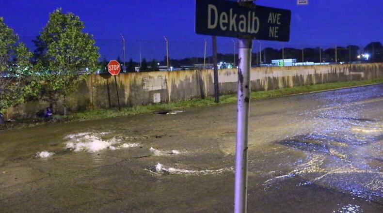 The scene Thursday morning on DeKalb Avenue after a water main break. On Friday morning, a leak once again closed the major thoroughfare.
