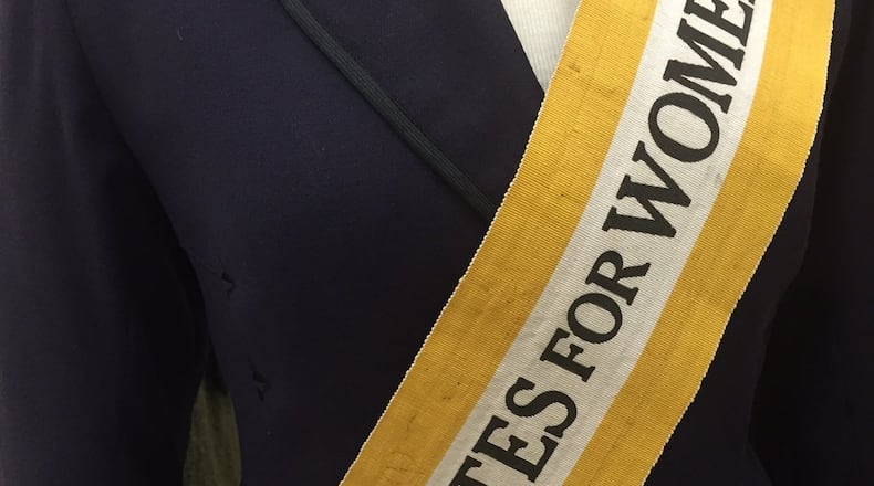 A 1918 sash from the women’s suffrage movement is included in the Atlanta History Center exhibition “Gatheround: Stories of Atlanta.” CONTRIBUTED BY ATLANTA HISTORY CENTER