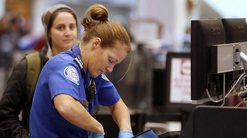 A Transportation Security Administration officer at work. (George Frey/Bloomberg)