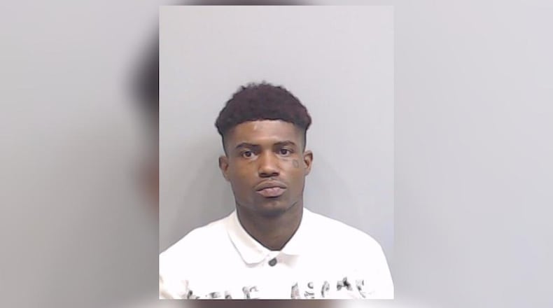 Derrick Elliot, 27, is charged with murder in the fatal shooting of a 26-year-old at a southeast Atlanta home.