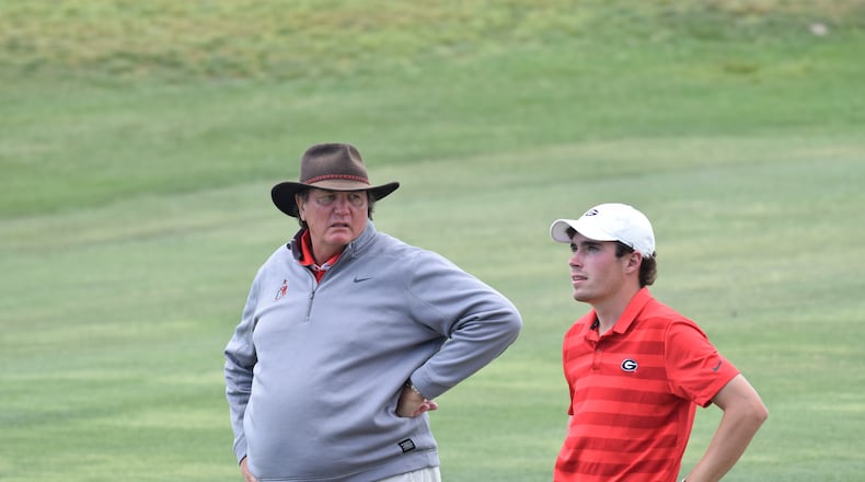 Georgia' golf coach Chris Haack (left), talking to senior Will Kahlstorf in a tournament earlier this season, has agreed to a five-year contract extension to remain the Bulldogs' director of golf.