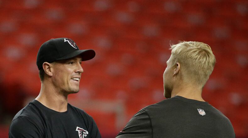 Atlanta Falcons quarterback Matt Ryan, left speaks with Tampa Bay Buccaneers quarterback Josh McCown (12) before the first half of an NFL football game, Thursday, Sept. 18, 2014, in Atlanta. (AP Photo/David Goldman) Matt Ryan and Tampa Bay's Josh McCown chat it up before tonight's game. (AP)