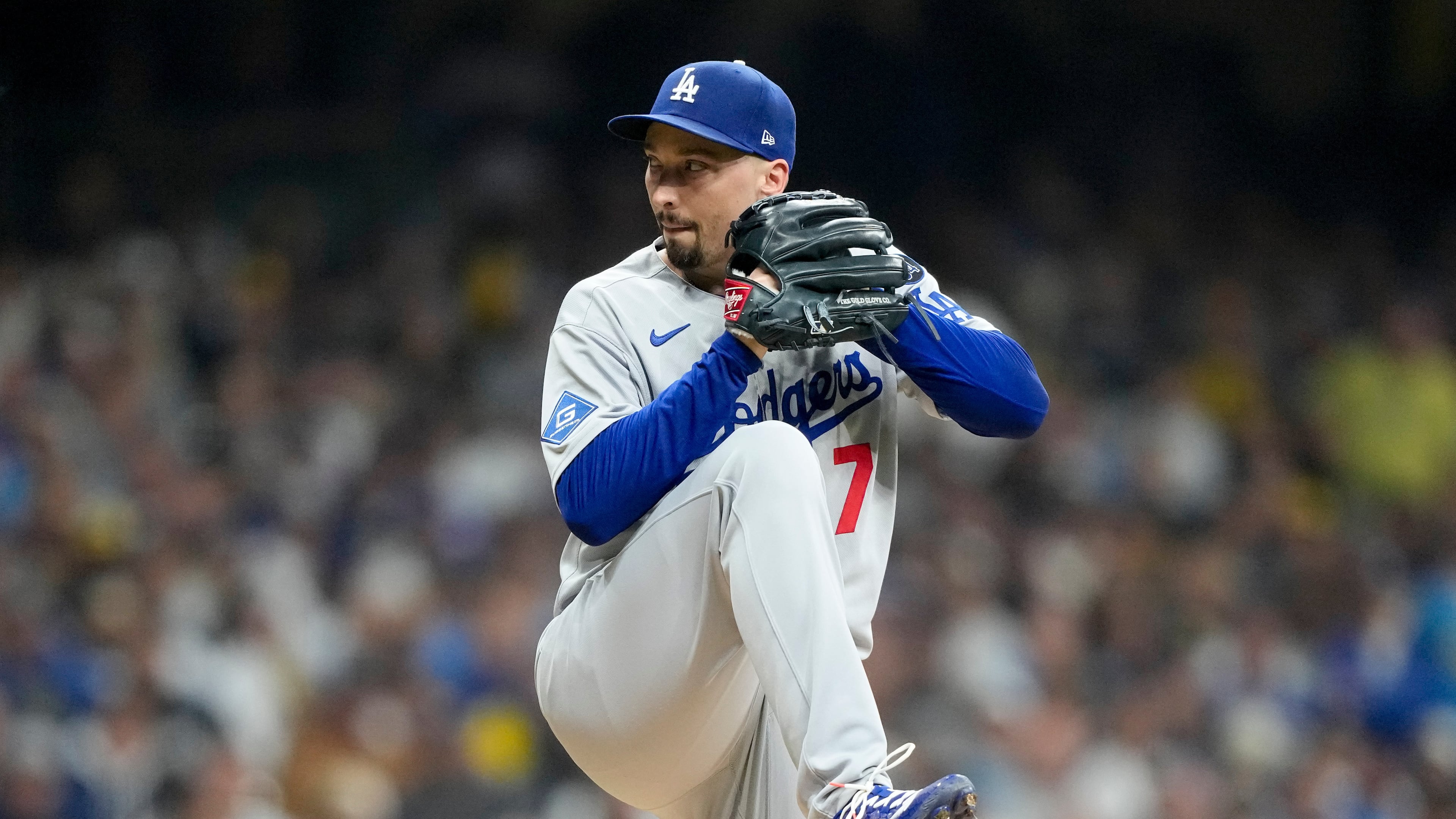 Los Angeles Dodgers pitcher Blake Snell throws against the Milwaukee Brewers during the first inning in Game 1 of baseball's National League Championship Series, Monday, Oct. 13, 2025, in Milwaukee. (AP Photo/Brynn Anderson)