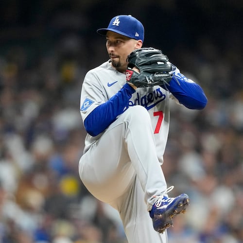 Los Angeles Dodgers pitcher Blake Snell throws against the Milwaukee Brewers during the first inning in Game 1 of baseball's National League Championship Series, Monday, Oct. 13, 2025, in Milwaukee. (AP Photo/Brynn Anderson)