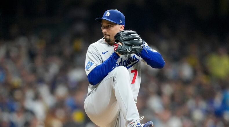 Los Angeles Dodgers pitcher Blake Snell throws against the Milwaukee Brewers during the first inning in Game 1 of baseball's National League Championship Series, Monday, Oct. 13, 2025, in Milwaukee. (AP Photo/Brynn Anderson)