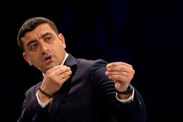 FILE - Presidential candidate George Simion gestures during a live electoral debate with presidential candidate Nicusor Dan ahead of the second round of the country's presidential election redo in Bucharest, Romania, Thursday, May 8, 2025. (AP Photo/Andreea Alexandru, File)