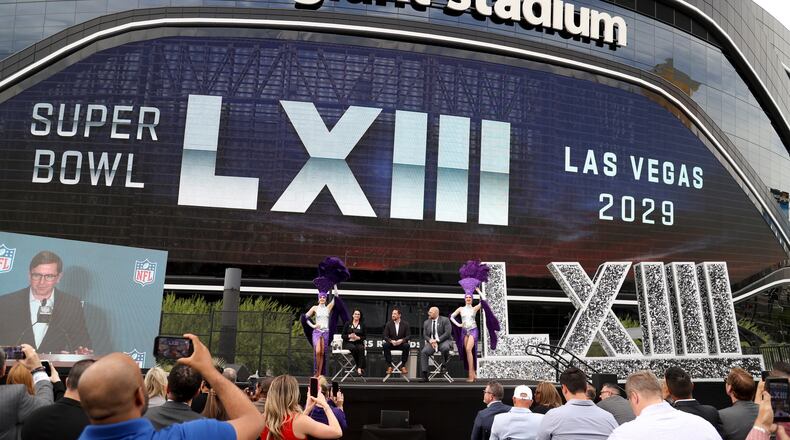 LVCVA Chief Sports Officer Janis Burke, LVCVA board member Michael Naft, and Las Vegas Raiders Chief Legal Officer and General Counsel Justin Carley talk during a press conference announcing Las Vegas as the host city for Super Bowl LXIII at Allegiant Stadium Monday, March 30, 2026, in Las Vegas. (AP Photo/Ian Maule)