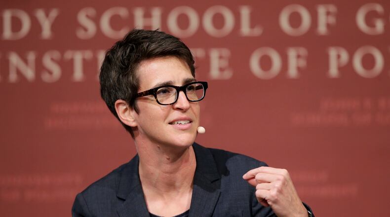 FILE - MSNBC television anchor Rachel Maddow, host of the Rachel Maddow Show, moderates a panel Oct. 16, 2017, at the Harvard University campus, in Cambridge, Mass. (AP Photo/Steven Senne, File)