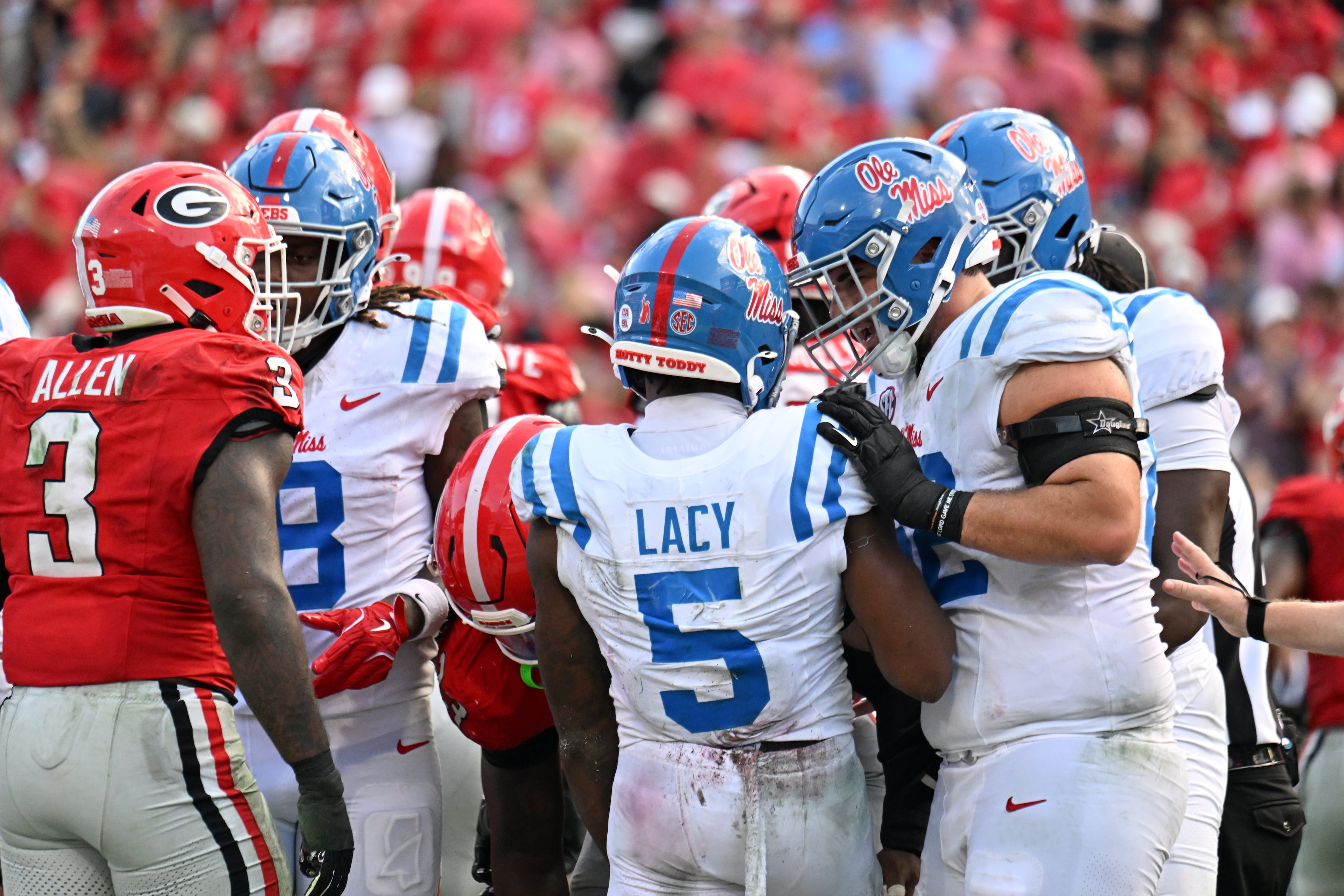 Mississippi running back Kewan Lacy (5) celebrates after scoring a touchdown during the first half in an NCAA football game at Sanford Stadium, Saturday, October 18, 2025, in Athens. (Hyosub Shin / AJC)