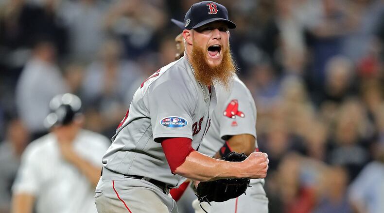 Craig Kimbrel of the Boston Red Sox celebrates after beating the New York Yankees to win Game 4 of the American League Division Series at Yankee Stadium on October 09, 2018. (Photo by Elsa/Getty Images)