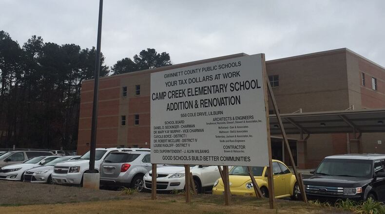 Gwinnett school officials are building an addition to Camp Creek Elementary School to ease overcrowding. About 60 Camp Creek students, some of whom are taking classes in trailers, may have to attend another school next year because of proposed school boundary lines.