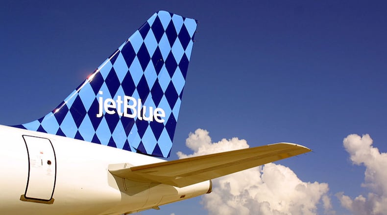 FILE PHOTO: A JetBlue Airways jet sits on a tarmac.