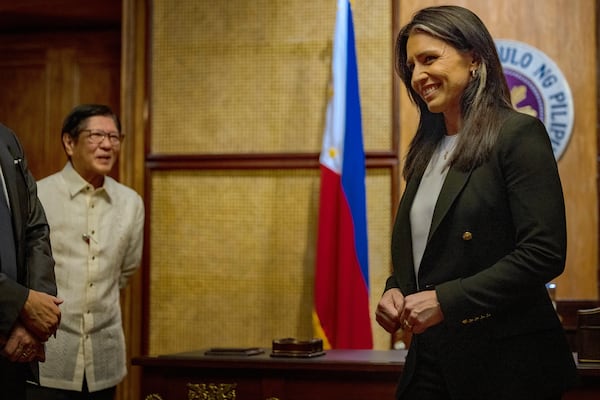U.S. Director of National Intelligence Tulsi Gabbard (right) — here after a meeting Monday, June 2, 2025, with Philippine President Ferdinand Marcos Jr. — testified to Congress in March that Iran is not building nuclear weapons. Reminded of the testimony, President Donald Trump dismissed it: “I don’t care what she said.” (Ezra Acayan/AP)