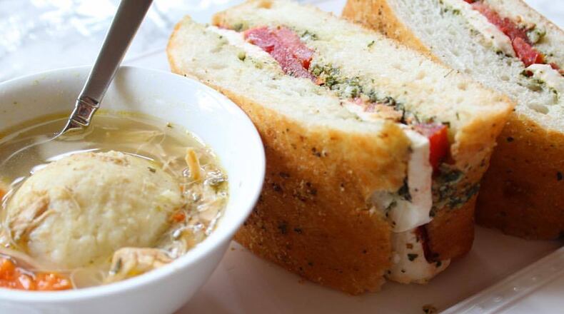 Matzoh ball soup and caprese sandwich from Breadwinner Cafe and Bakery.