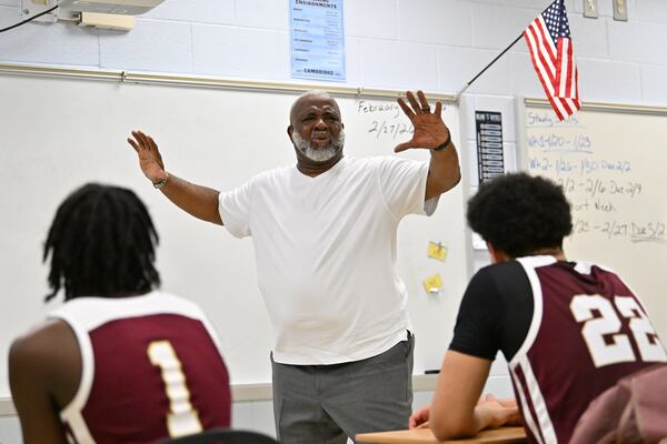 Tucker coach James Hartry coaches the team during halftime of the Tigers' state playoff game Saturday, Feb. 28, 2026, against Cambridge in Milton. Tucker trailed 37-25 but went on a 14-3 run to start the second half before ultimately falling short, 58-56. (Hyosub Shin/AJC)