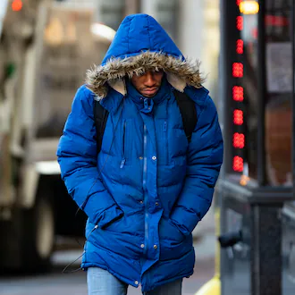 A pedestrian walks up the sidewalk on Hurt Plaza SE in downtown Atlanta in sub-freezing temperatures Tuesday. This weekend is expected to be just as cold, with a chance of snow, in metro Atlanta. (Ben Hendren for the AJC)