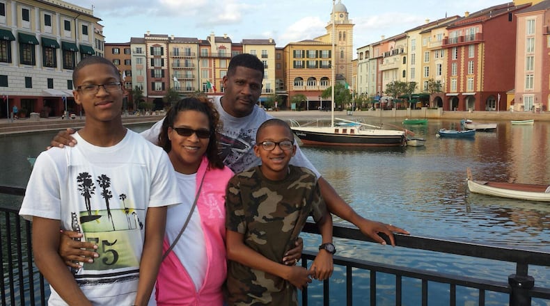 Riverdale police Maj. Greg ‘Lem’ Barney with his family, son Robert (left), wife Lisa and son Greg Barney (right). (Family photo)