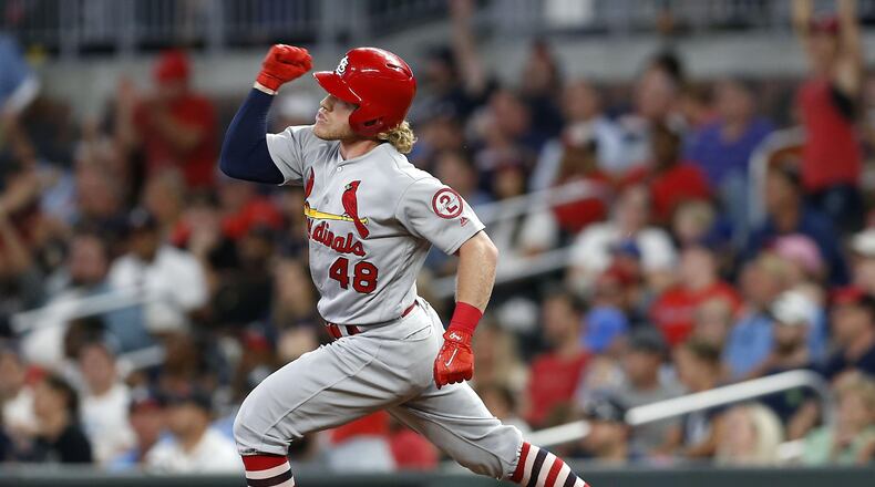 Harrison Bader  of the St. Louis Cardinals gestures after hitting a 3-run home run in the eighth inning during the game against the Atlanta Braves at SunTrust Park on September 17, 2018 .