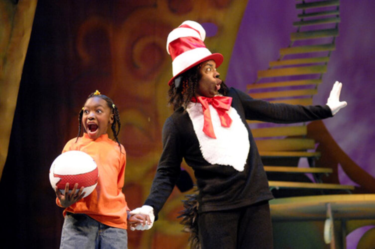 Appling girl immersed in Dr. Seuss' world