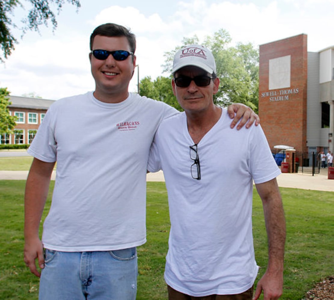 Charlie Sheen tours tornado damage in Alabama