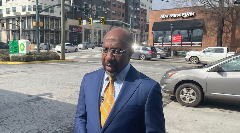 U.S. Sen. Raphael Warnock visits a Sandy Springs BP station to call for a fuel tax holiday to stem rising gas prices.