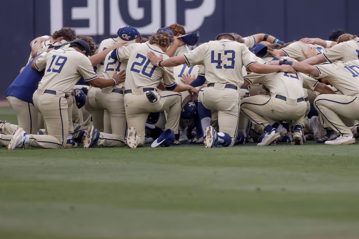 Georgia Tech baseball players gather in the outfield before the first pitch against Oklahoma on Sunday, May 31, 2026. (Erik S. Lesser for the AJC)