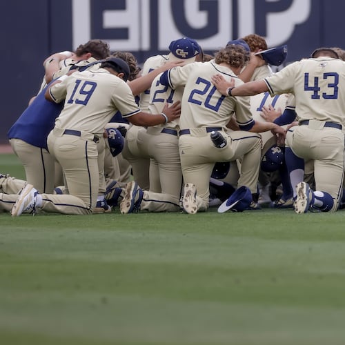 Georgia Tech baseball players gather in the outfield before the first pitch against Oklahoma on Sunday, May 31, 2026. (Erik S. Lesser for the AJC)