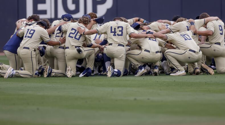 Georgia Tech baseball players gather in the outfield before the first pitch against Oklahoma on Sunday, May 31, 2026. (Erik S. Lesser for the AJC)