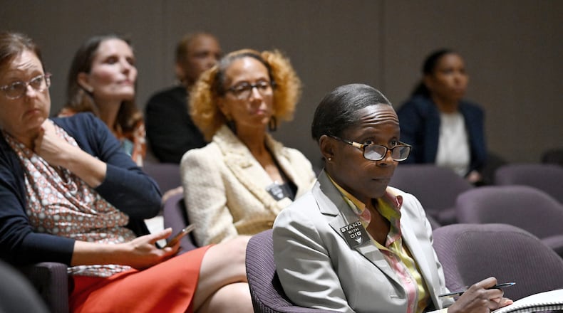 Inspector General Shannon Manigault sits among other attendees during the first meeting of a task force established to review the inspector general's authority at Atlanta City Hall, Tuesday, September 24, 2024, in Atlanta. The task force established to review the procedures of the Office of the Inspector General and Ethics Office met for the first time Tuesday. (Hyosub Shin / AJC)