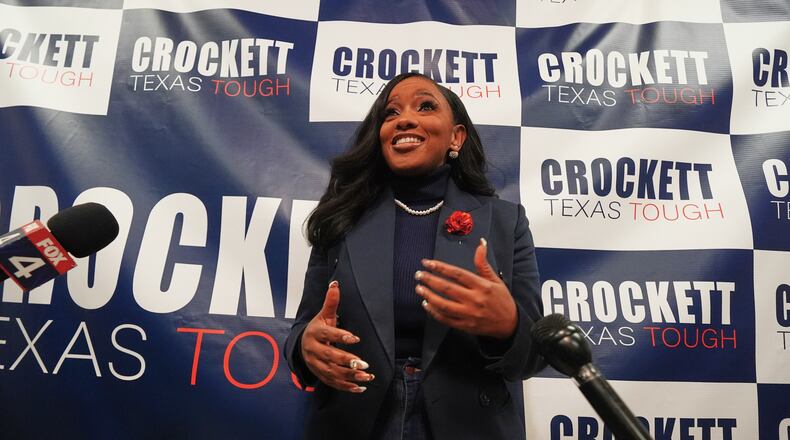 Rep. Jasmine Crockett, D-Texas, speaks to reporters after announcing her run in the Democratic primary for U.S. Senate, Monday, Dec. 8, 2025, in Dallas. (AP Photo/LM Otero)