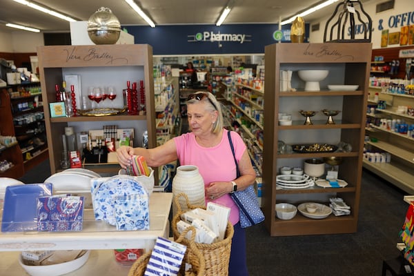Jackie Murphy shops at Wender & Roberts Pharmacy in Atlanta on Aug. 10, 2026. (Arvin Temkar/AJC)