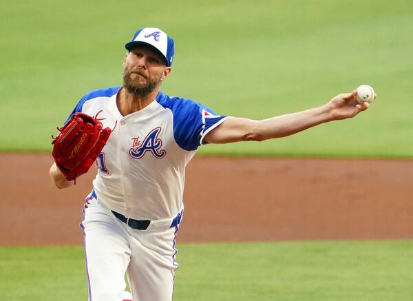Atlanta Braves pitcher Chris Sale delivers against the Minnesota Twins during the first inning in a baseball game Saturday, April 19, 2025, in Atlanta. (AP Photo/ John David Mercer)