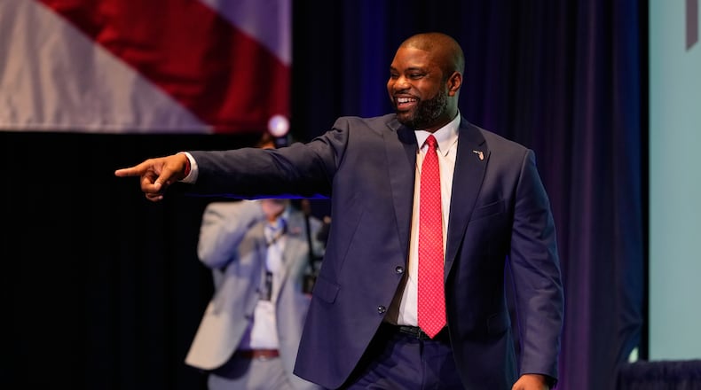 Florida Republican gubernatorial candidate Byron Donalds points at supporters during at a primary election party Tuesday, Aug. 18, 2026, in Orlando, Fla. (AP Photo/John Raoux)